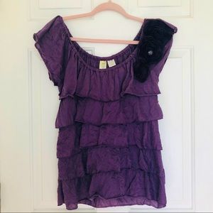 Purple ruffle shirt with floral appliqué